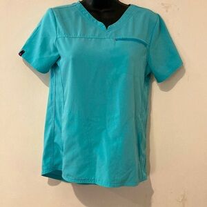Scrubstar Teal Scrub Set.Font pocket scrub top with zipper scrub bottoms.